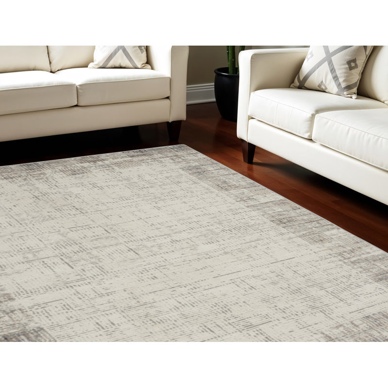 Tapis abstrait ivoire et gris 8 pi x 10 pi