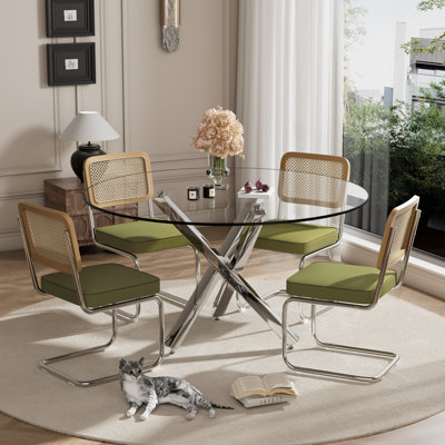 1 table de salle à manger en verre trempé et 4 chaises en porte-à-faux en velours