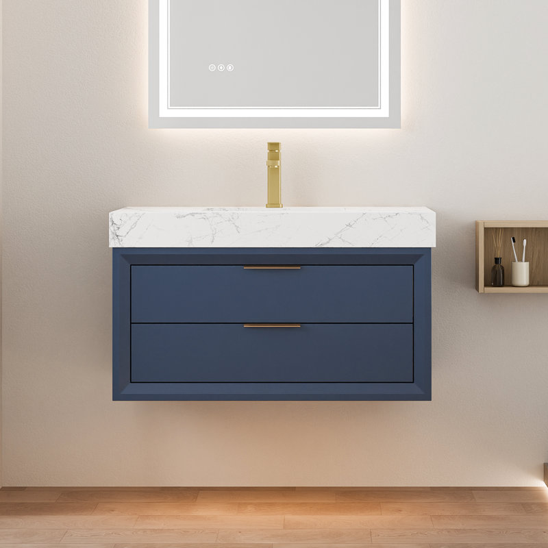 Meuble-lavabo suspendu bleu de 91 cm (36 po) avec éclairage DEL, comptoir en marbre reconstitué, lavabo encastré et tiroirs à fermeture amortie.