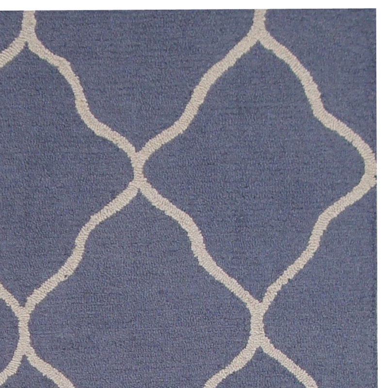Tapis mauve / ivoire touffeté à la main