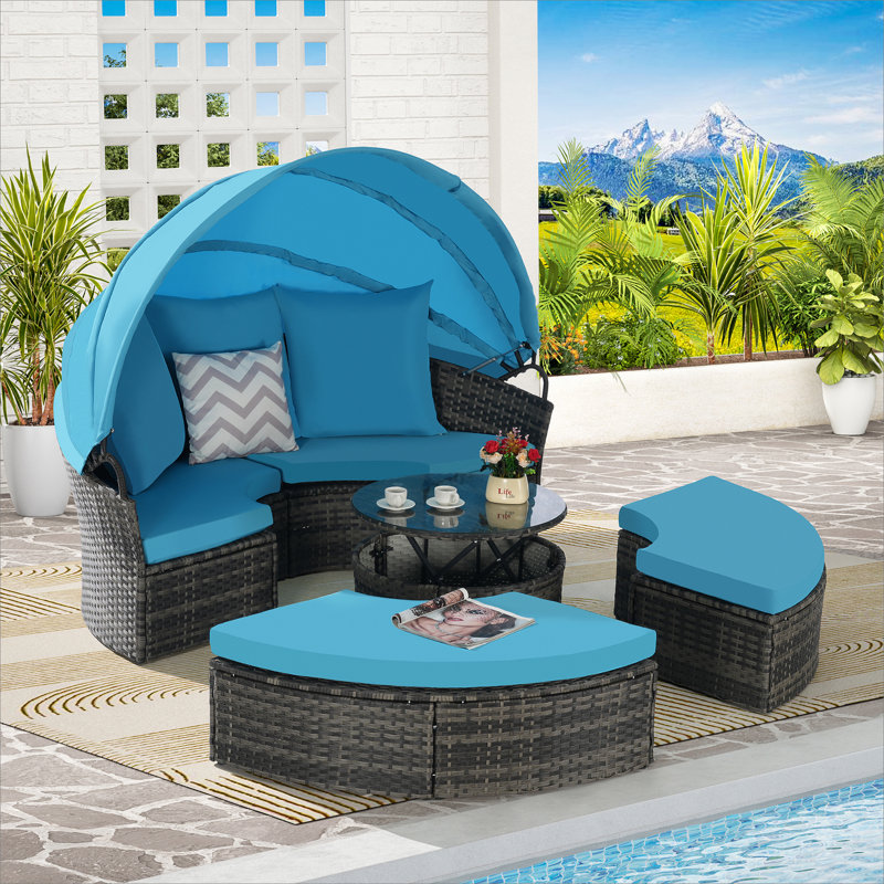 Lit de jour d'extérieur pour terrasse avec auvent rétractable, coussins moelleux et table de rangement pour les loisirs dans la cour arrière
