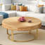 Table basse ronde moderne avec motif sculpté et pieds en métal-11240829