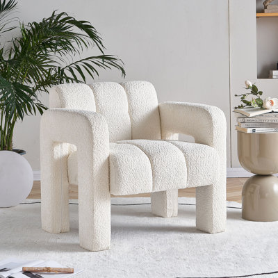 Charming Boucle Upholstered Accent Chair With Comfortable Seating, Unique Design, And Easy Maintenance For A Cozy Living Space.