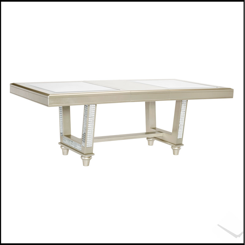 Table de salle à manger glamour à tréteaux avec plateau en verre et rallonge décorative au fini champagne