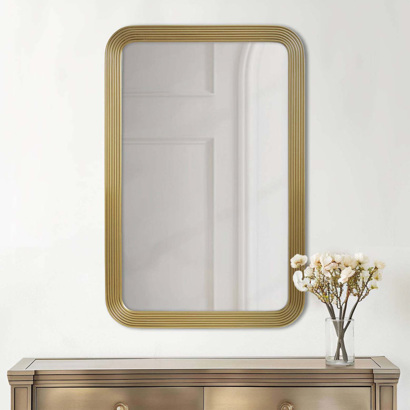 Miroir mural rond arrondi cannelé doré Voir ci-dessous