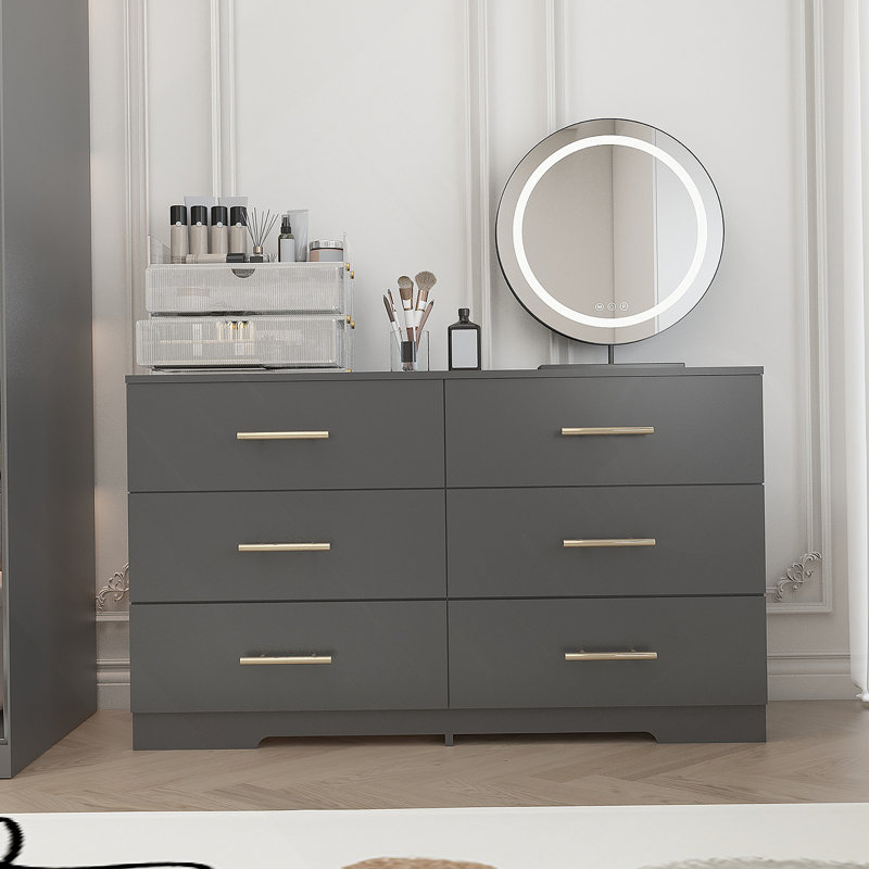 Grande commode 6 tiroirs de couleur noire avec poignée dorée