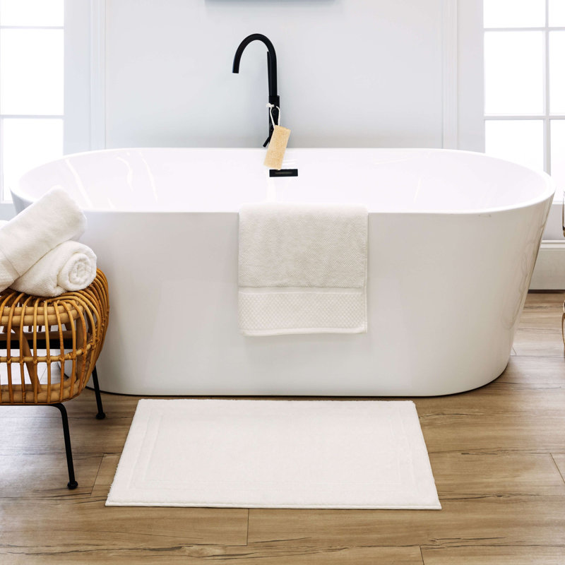 Diplomat Solid Polyester Machine Washable Knitted Bath Mat, 24" W x 40" L, White