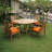 Arnott 4 - Person Teak Wood Patio Dining Set with