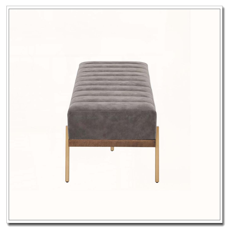 Banquette rembourrée capitonnée avec pieds dorés