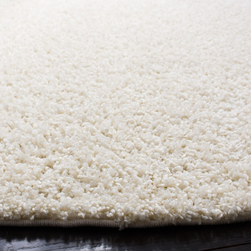 Tapis de couleur unie à poils longs Schwanke Performance, Rond 6 pi 7 po