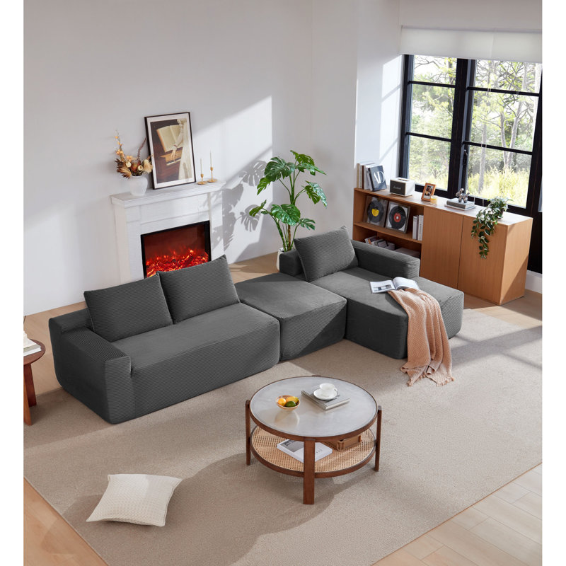 Canapés modulaires spacieux en tissu gris moelleux, style de vie moderne