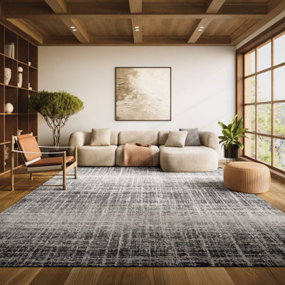 Riebe Black Area Rug