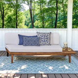 Canapé modulaire en bois avec coussins Bynum