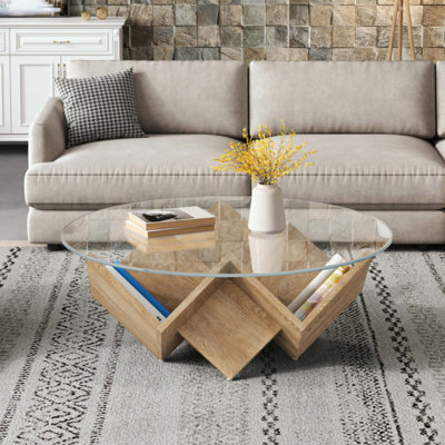 La table basse ronde avec plateau en verre et tablettes de rangement à motif géométrique abstrait Art Deco