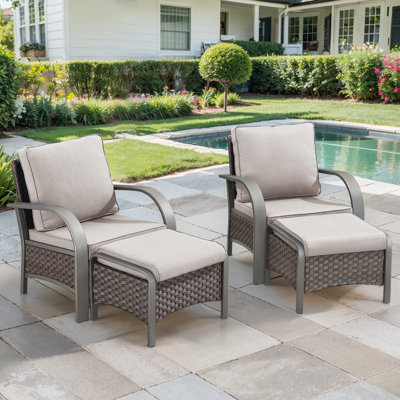 Chaises d'extérieur en rotin avec coussins et repose-pieds Bobra