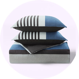 Blue and charcoal striped comforter set with matching pillows