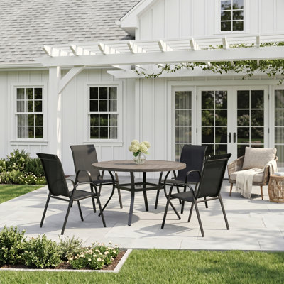 4-Person Round Patio Dining Set With Stackable Textilene Chairs