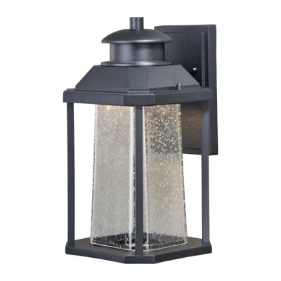 Farren 13.5 in. H 1-Light Textured Black Dusk to Dawn Sensor Outdoor Wall Sconce, Rust-Resistant Aluminum, Clear Seeded Glass Shade, Integrated LED for Porch Patio Front Door or Garage
