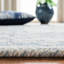 Tapis bleu / ivoire en laine touffeté à la main Lethe-1401441831