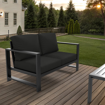 Causeuse d'extérieur Oltjana avec coussins Sunbrella®