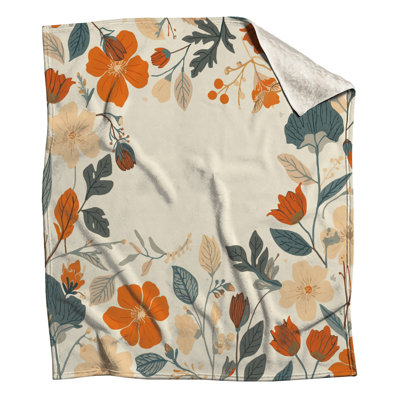 Couvertures florales orange et beige