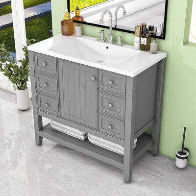 Ensemble de meuble-lavabo avec lavabo, une armoire et trois tiroirs