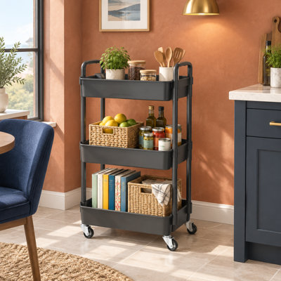 Chariot noir peu encombrant pour la maison ou le bureau - 3 tablettes de rangement robustes en plastique, un petit tiroir intégré et des roulettes en métal à roulement doux