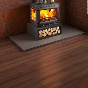 Wood-burning stove with wood storage compartment