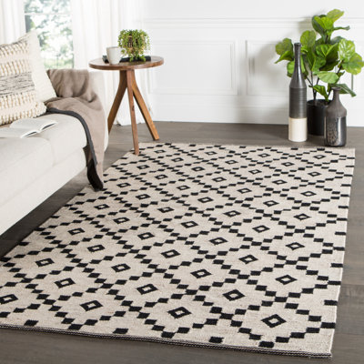 Tapis noir / ivoire en laine tissé à plat à la main à motif géométrique Byrne