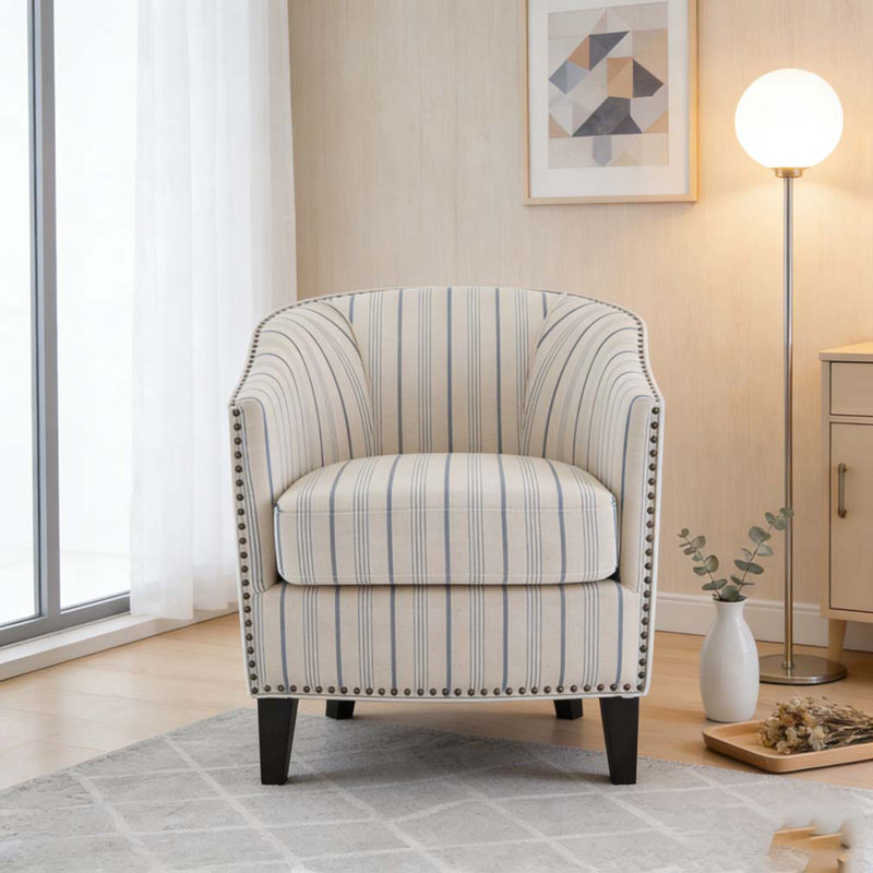 Fauteuil demi-tonneau rembourré à rayures