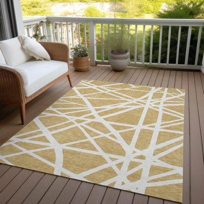 Tapis intérieur / extérieur doré Zephina 