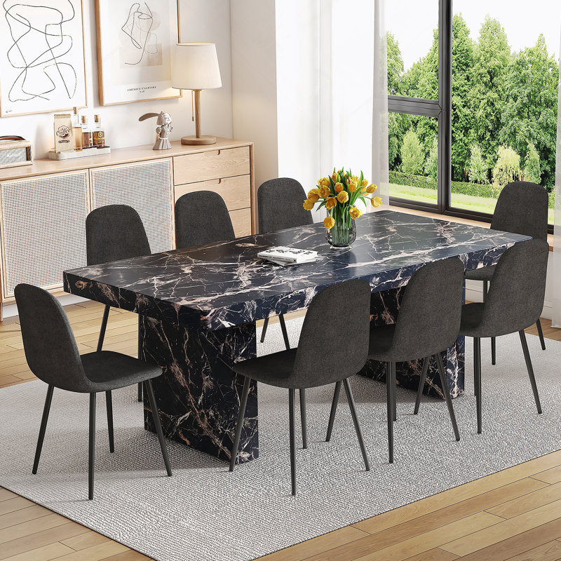 Ensemble de table de salle à manger et de chaises de style Mid-Century luxueux en marbre noir, multifonctionnel et durable pour les intérieurs modernes