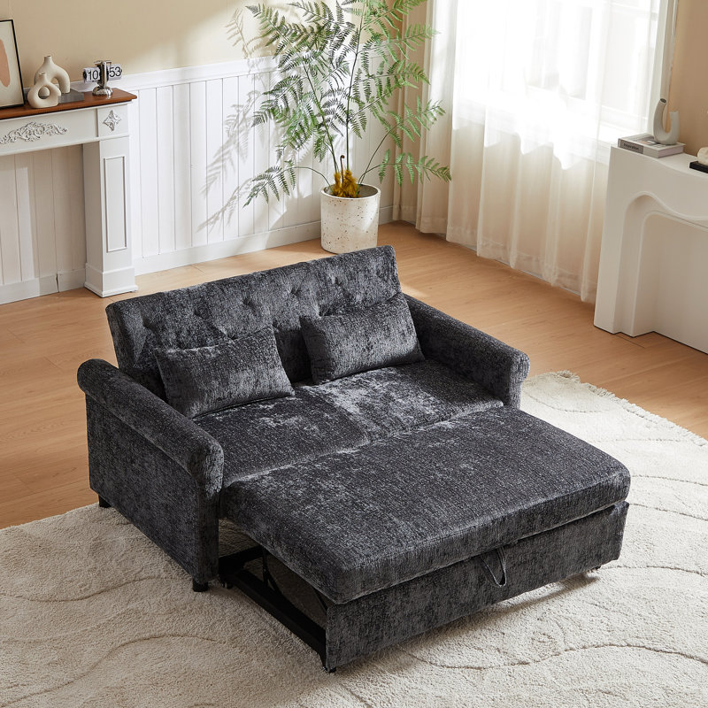 Lit tapissier gris foncé avec accoudoirs coussinés et sac de rangement revêtu de tissu