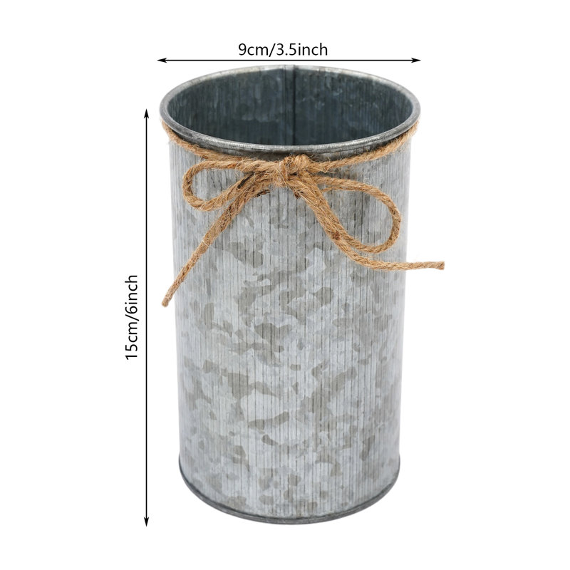 Vase à fleurs en métal avec nœud en ficelle