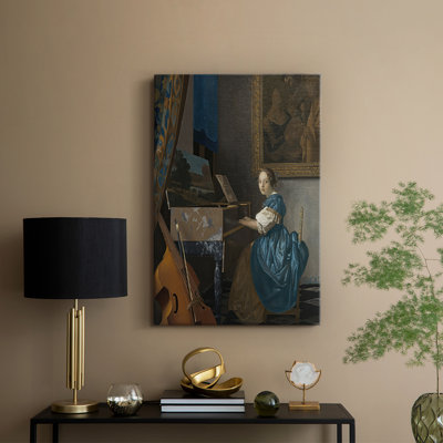 Une jeune femme assise sur une toile virginal - galerie tendue sur toile par Johannes Vermeer