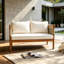 Causeuse d'extérieur en bois d'acacia avec coussins