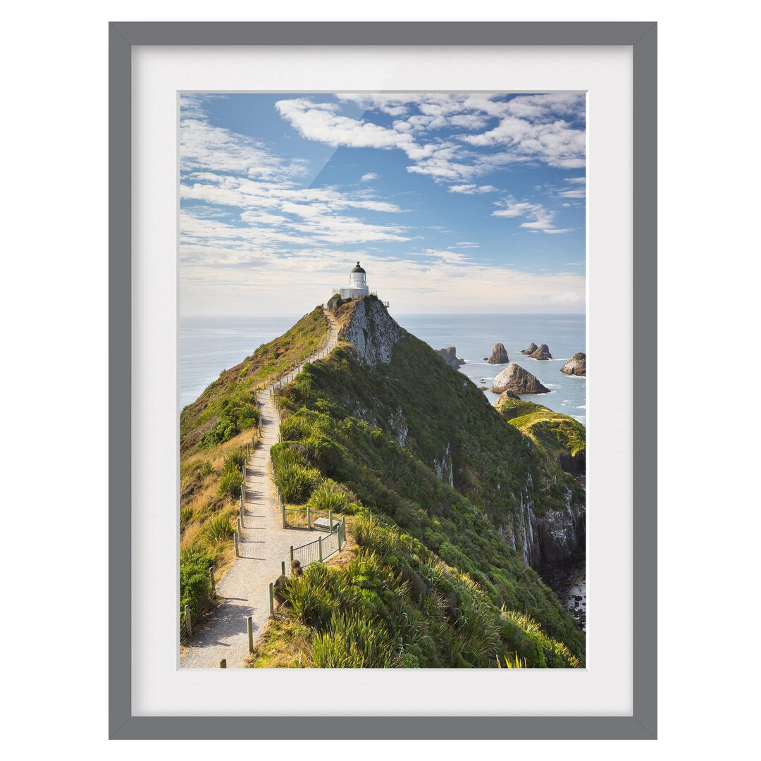 Gerahmtes Papierbild Nugget Point Leuchtturm und Meer Neuseeland