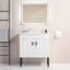 Meuble-lavabo de salle de bain avec pied en métal, lavabo en céramique et 2 portes à fermeture en douceur-106757409