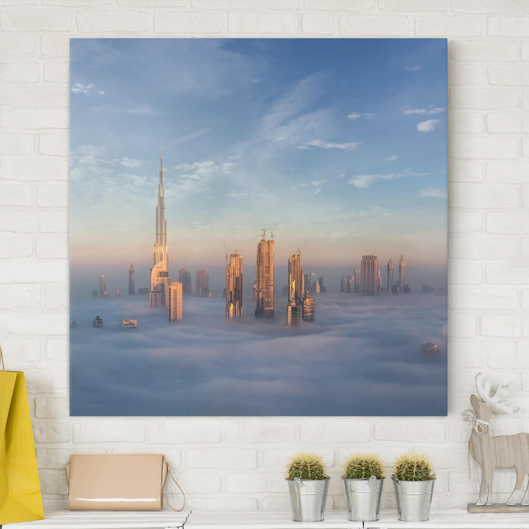 Leinwandbild Dubai über den Wolken