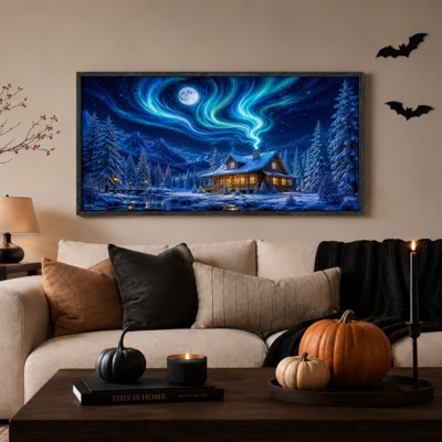 Cabane en bois rond enneigée dans les montagnes sous une aurore boréale bleue - Toile murale d'Halloween