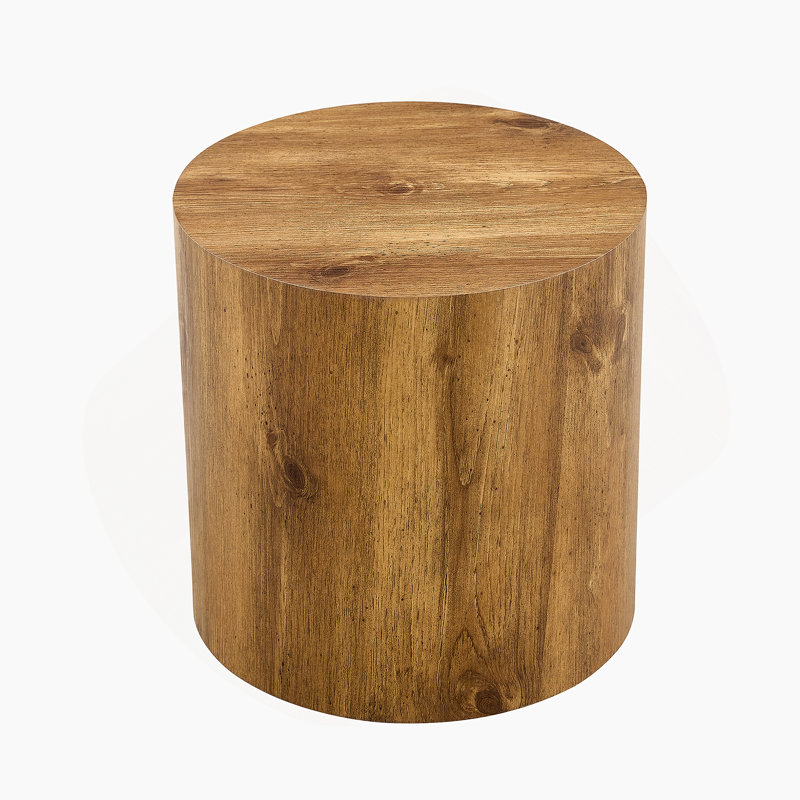 La table cylindrique avec sa conception à motif peut être facilement intégrée