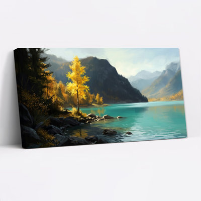 Tableau sur toile représentant un arbre jaune se reflétant dans un lac de montagne turquoise