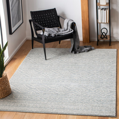 Tapis gris / ivoire Strouse