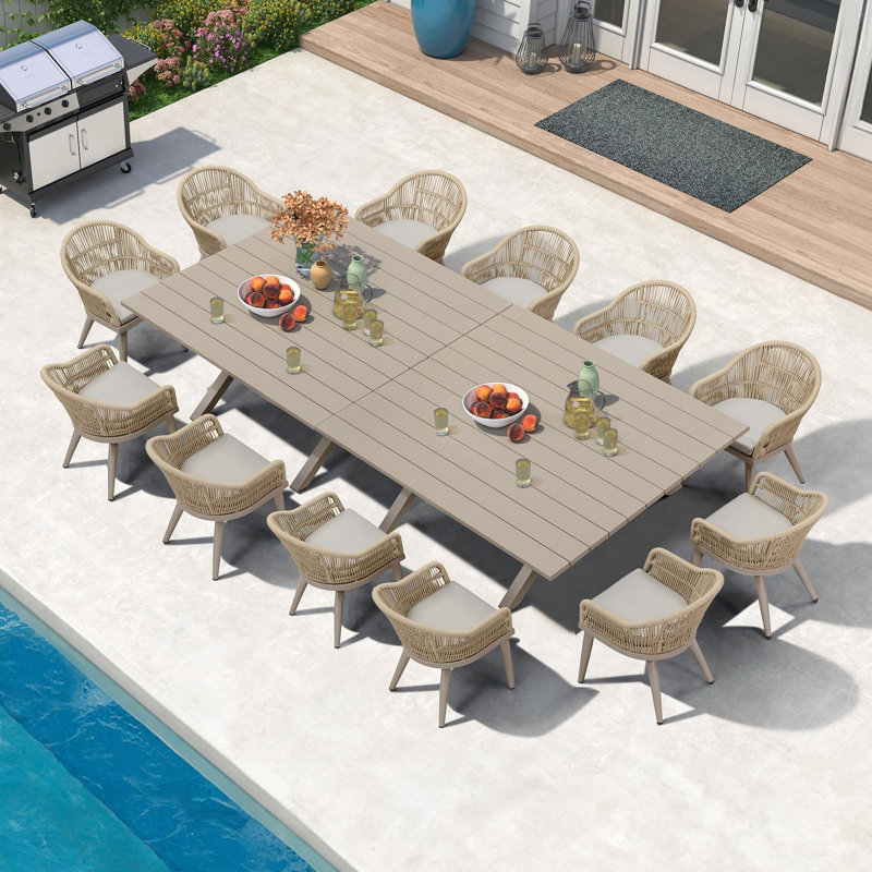 Ensemble de salle à manger surdimensionné pour terrasse avec table d'extérieur en aluminium et chaises tissées Corrigan Studio® 13 pièces