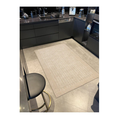 Tapis jaune à motif géométrique à carreaux