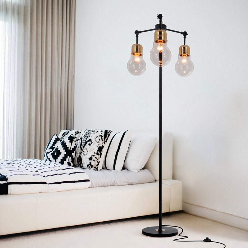 Lampe sur pied 3 lumières dorée / noire avec abat-jour en verre transparent