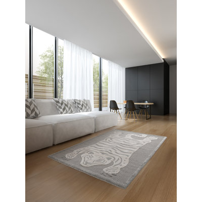 Erik Animal Print Area Rug