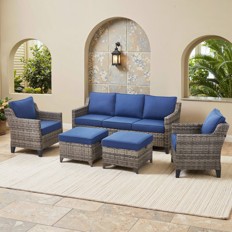 7 - Person Outdoor Wicker Patio Conversation Furniture Sofa Set With Ottomans, 4 Pieces:Sofa, Chair, 2 Ottoman, Blue