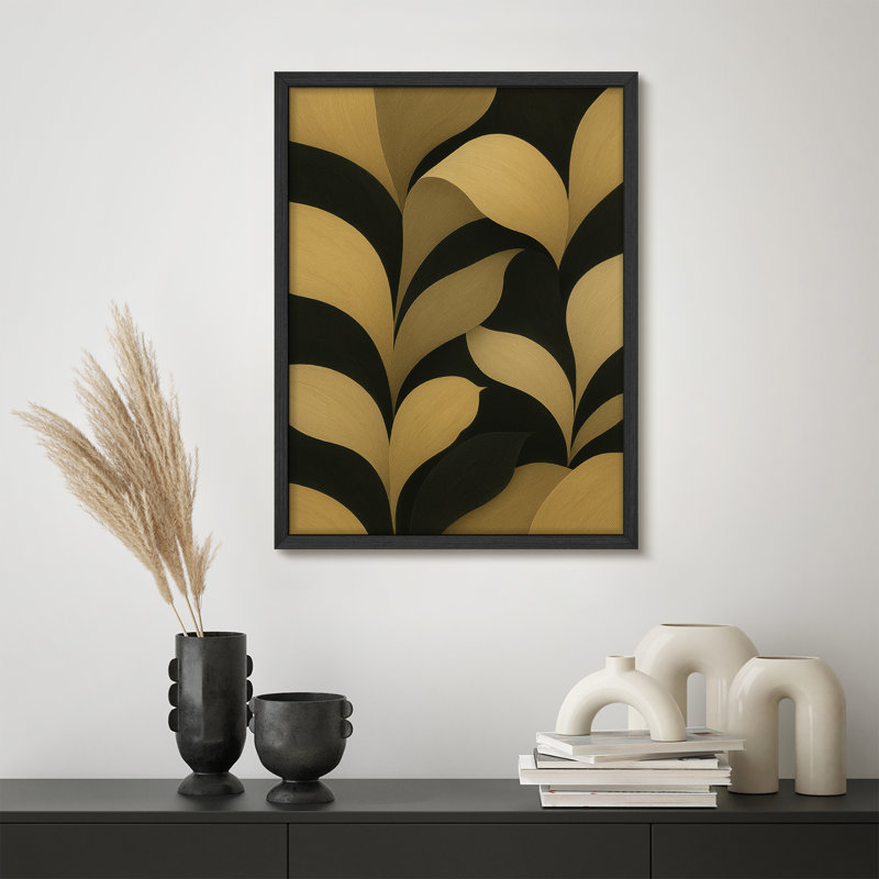 Reproduction d'art encadrée de feuilles abstraites dorées et noires, conception moderne inspirée de la nature pour une décoration intérieure contemporaine