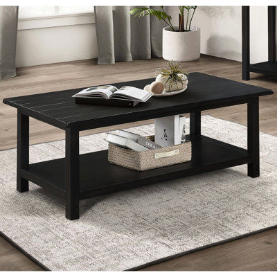 Table basse rectangulaire rustique, hauteur 46,5 cm, largeur 121,7 cm et profondeur 61 cm, finition vieillie, pour un salon décontracté et élégant. Table haute, large et profonde en bois massif, idéale pour le salon.